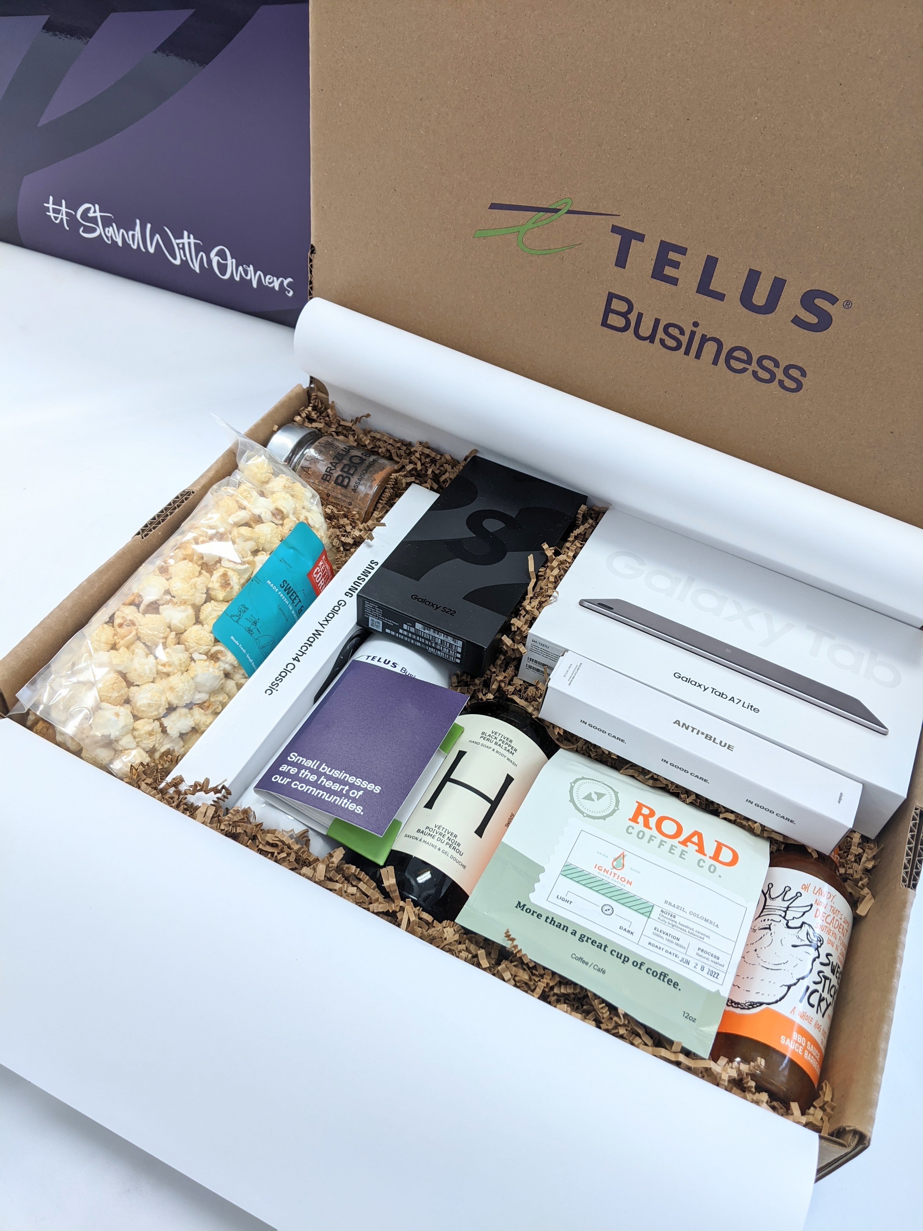 https://greywillowgifts.ca/cdn/shop/files/telus-stand-with-owners-gift-box.jpg?v=1664680493